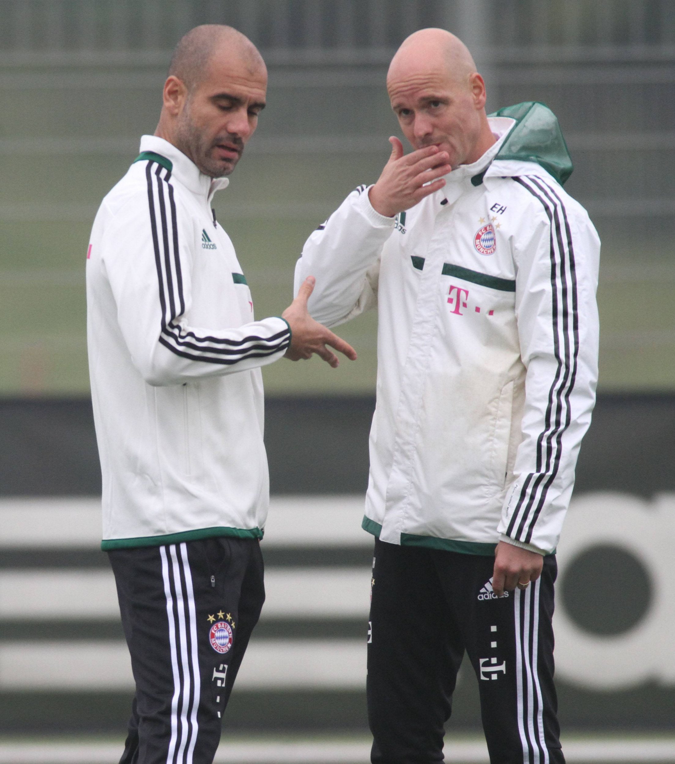 Bayern Munich team manager Pep Guardiola (left) in discussion with coach Erik Ten Hag FC during the Bayern Munich training session at the S?benerstr Training Centreon 8th October 2013.